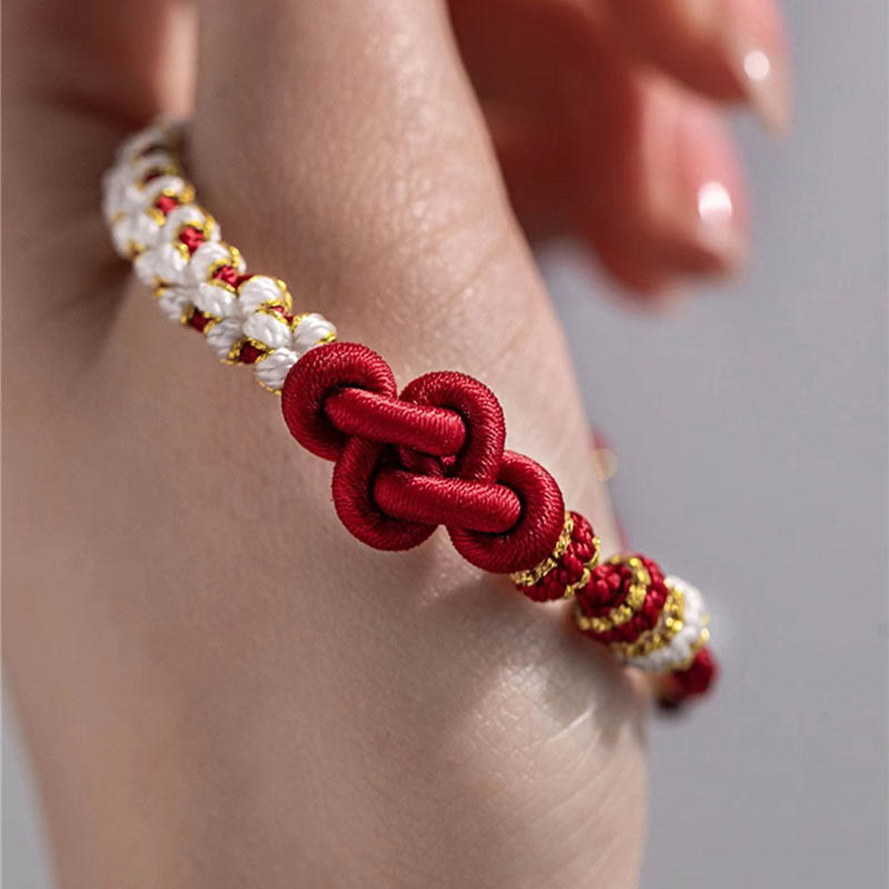 Pulsera de cuerda de la suerte con dije de flor de melocotón, nudo de amor verdadero hecho a mano con Buddha Stones