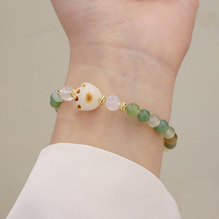 Buddha Stones Verde Piedra del Sol Ojo de Gato Semilla Bodhi Pulsera de Soporte de Pata de Gato - Ágata verde y ojo de gato - image 1