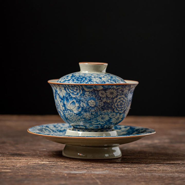 Buddha Stones azul y blanca vintage Flor de durazno Loto Peonía Cerámica Gaiwan Sancai Taza de té Kung Fu Taza de té y platillo con tapa