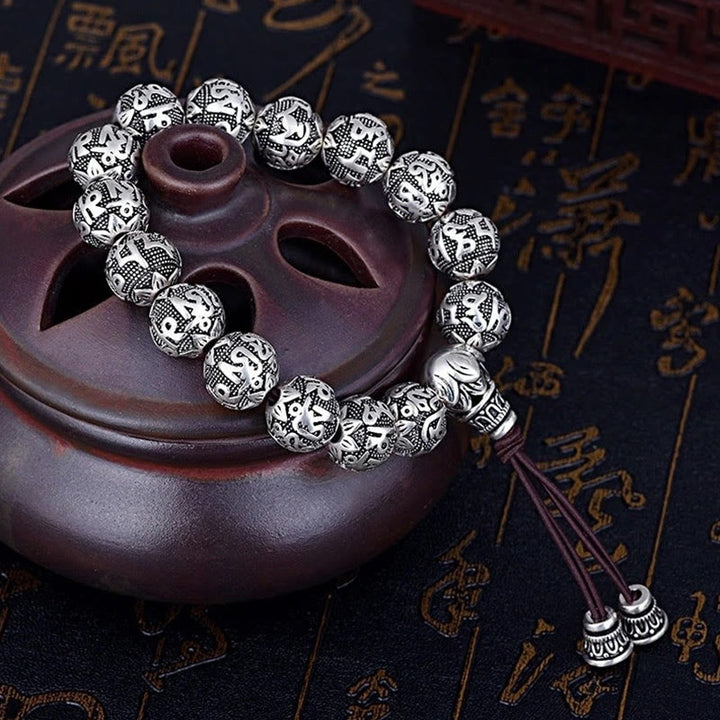 Pulsera de amuleto de cuentas de aleación tallada Om Mani Padme Hum tibetano con Buddha Stones