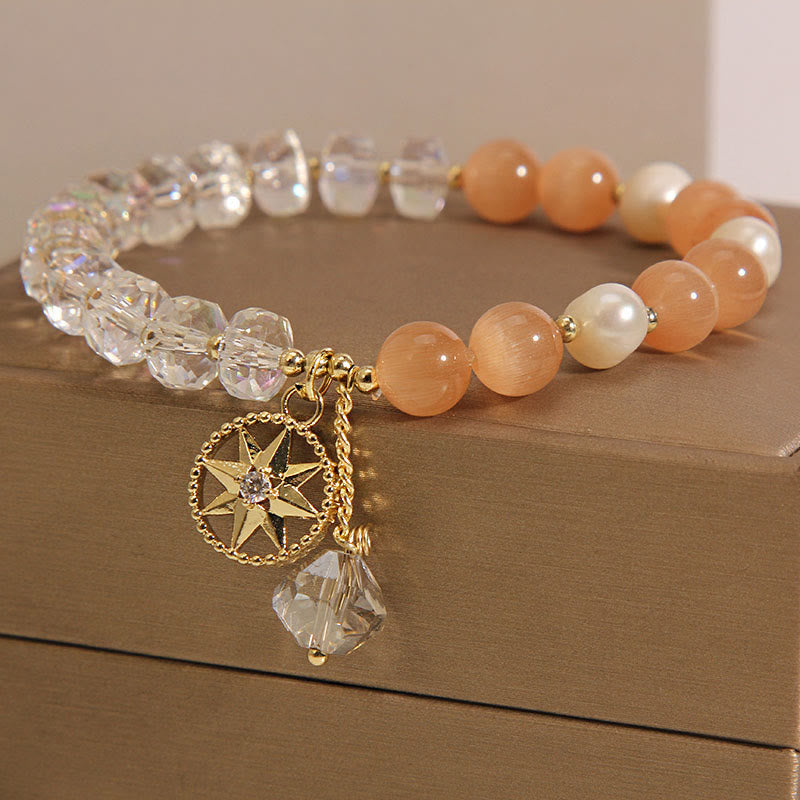 Pulsera de soporte con estrella de cristal blanco y ojo de gato naranja de Buddha Stones