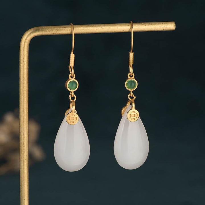 Pendientes colgantes de la suerte de jade blanco FengShui con Buddha Stones