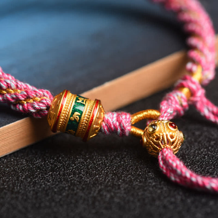 Pulsera de cuerda colorida con cuentas de rueda de oración de la suerte hecha a mano tibetana con Buddha Stones