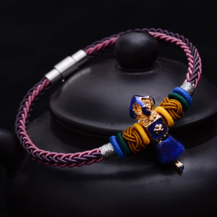 Pulsera tibetana hecha a mano Dorje Vajra fuerza ocho hilos cuerda