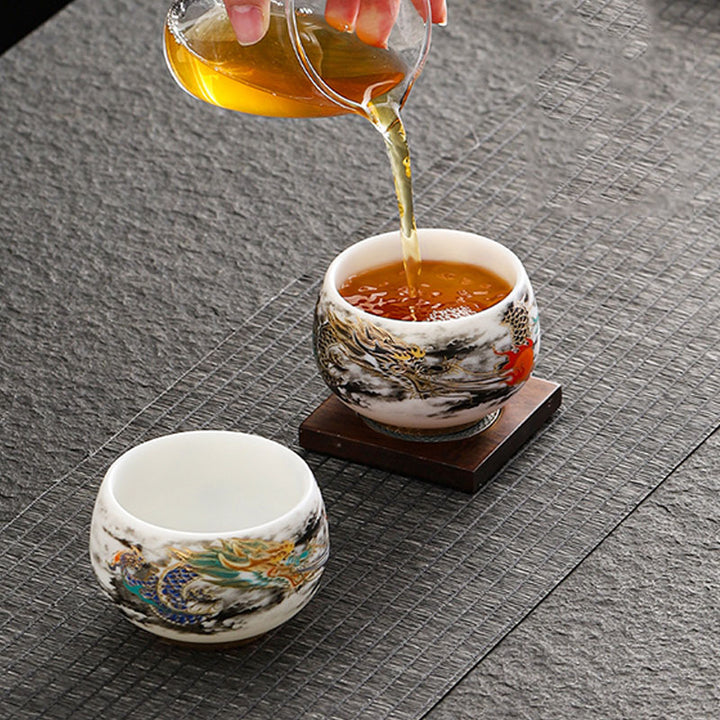 Taza de té de cerámica de porcelana blanca con diseño de dragón jugando con Buddha Stones, taza de té de Kung Fu de 160ml