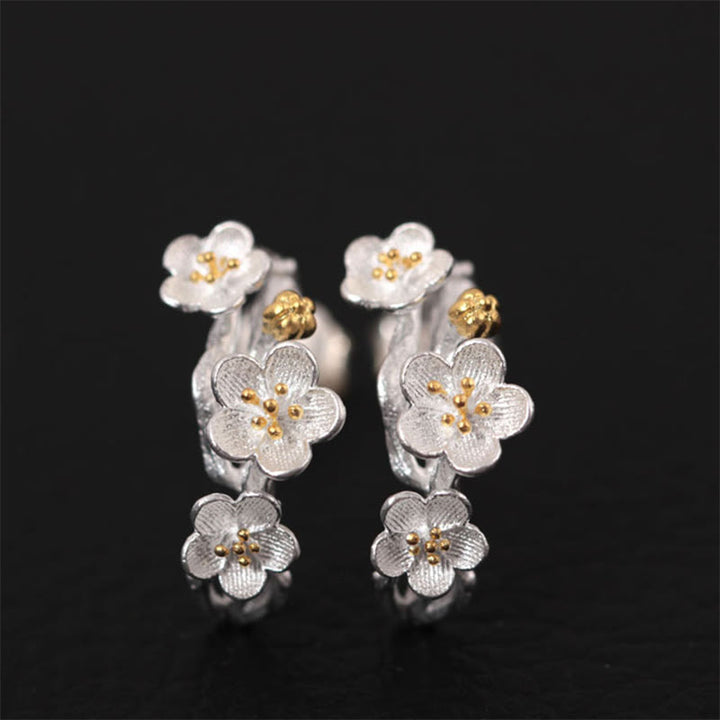 Pendientes de bendición floral de flor de ciruelo de plata de ley 925 con Buddha Stones