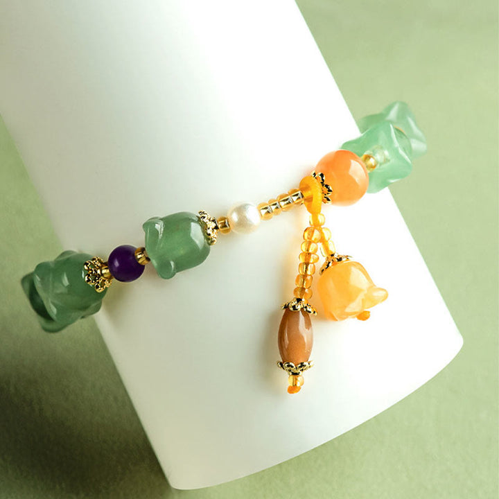 Pulsera de la Suerte con Flor de Magnolia y Aventurina Verde con Buddha Stones