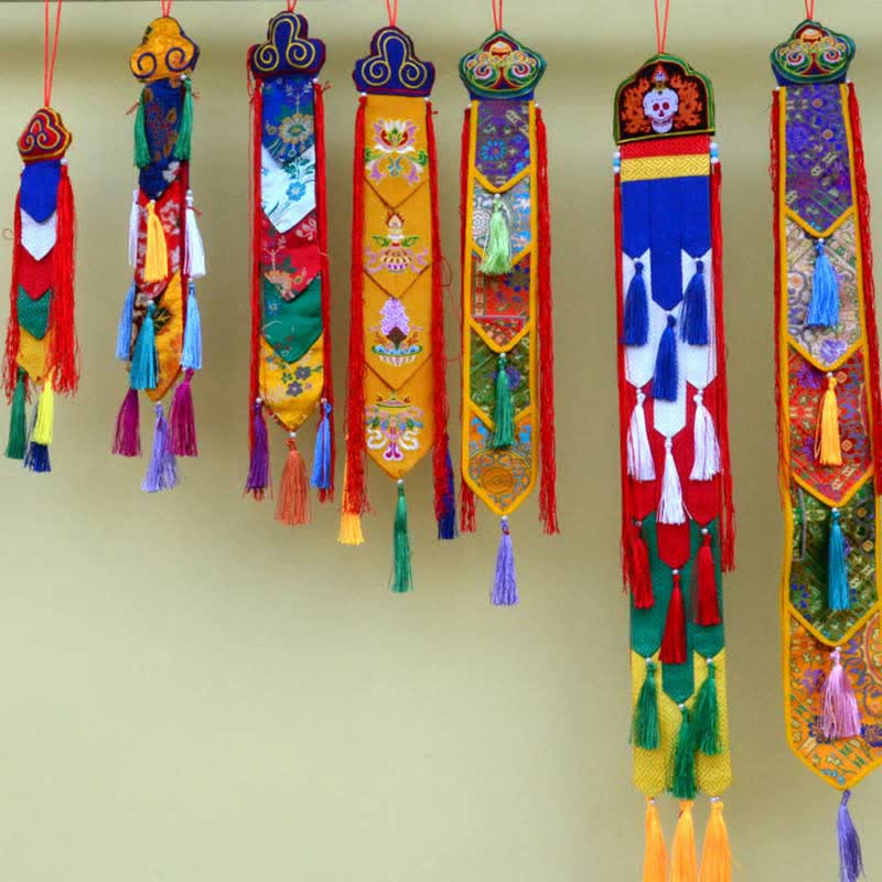 Flor de loto Ocho símbolos auspiciosos Meditación Iluminación Borlas coloridas Arte de pared