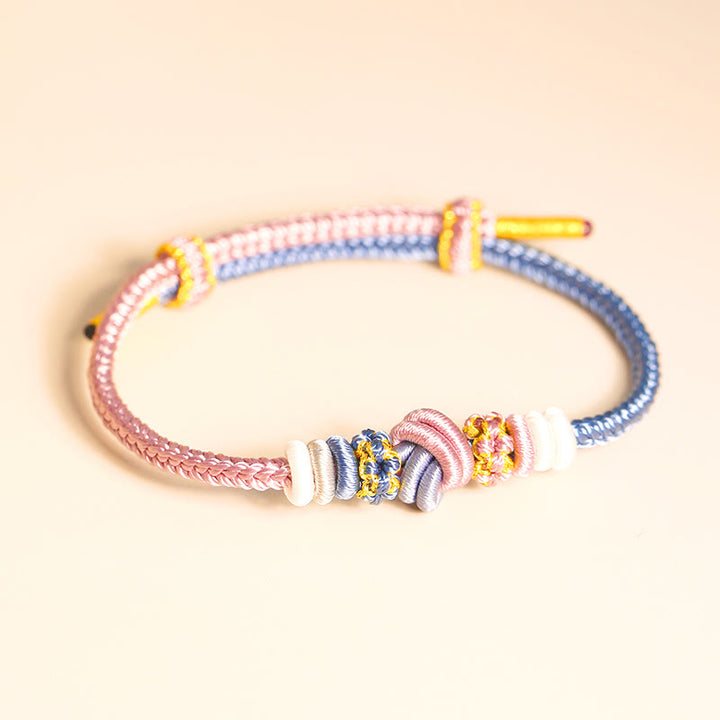 Pulsera de conexión de suerte con nudo de paz de ocho hilos hecha a mano con cuerda de dos colores con Buddha Stones