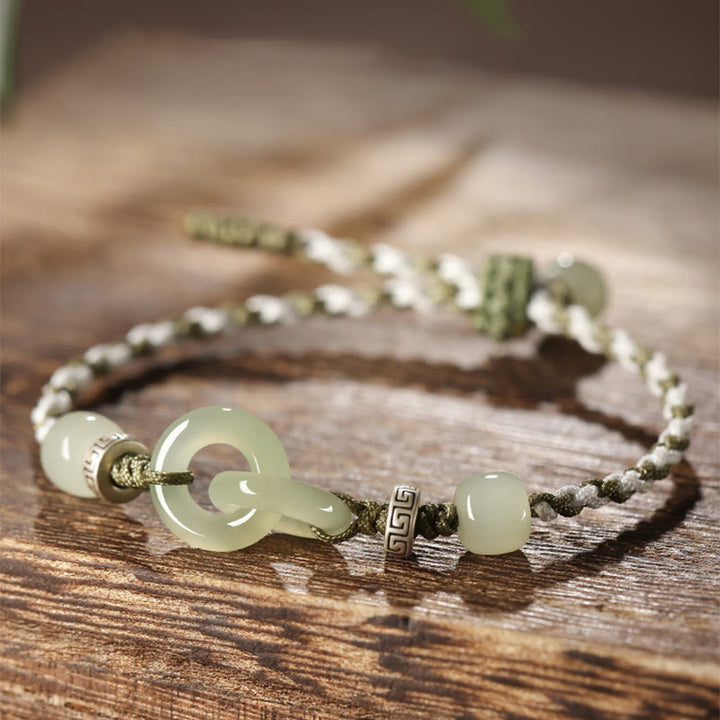 Pulsera trenzada de la suerte con hebilla de la paz y jade hetiano natural de Buddha Stones