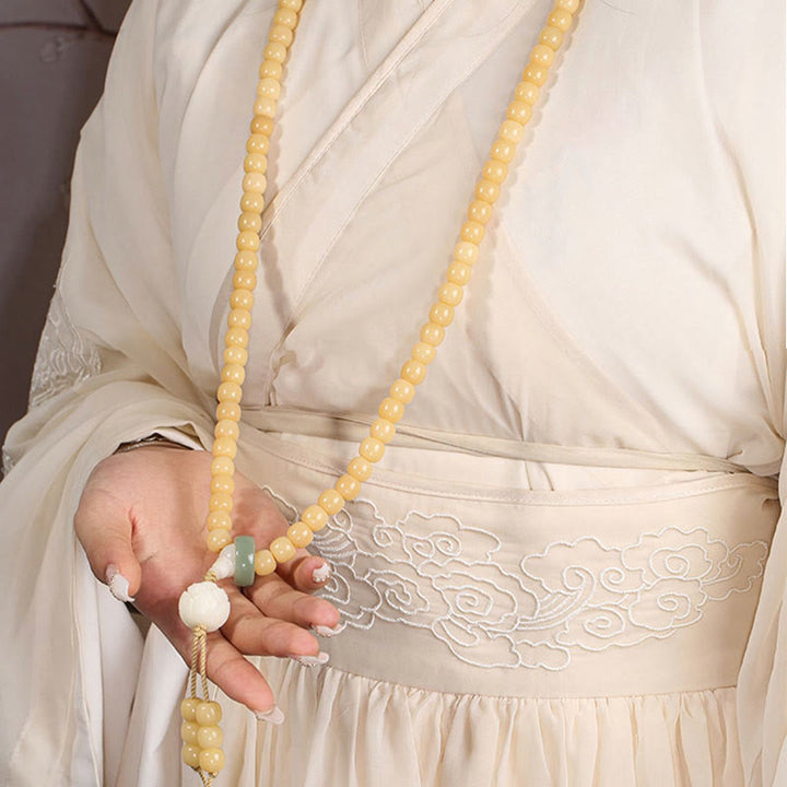 Pulsera con dije de armonía y paz con cuentas de loto y semilla de Bodhi Natural de Buddha Stones