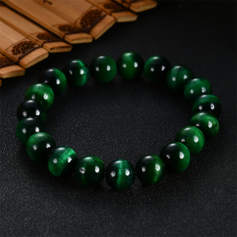 Pulsera de fuerza de ojo de tigre verde natural con Buddha Stones - 14 mm - image 0