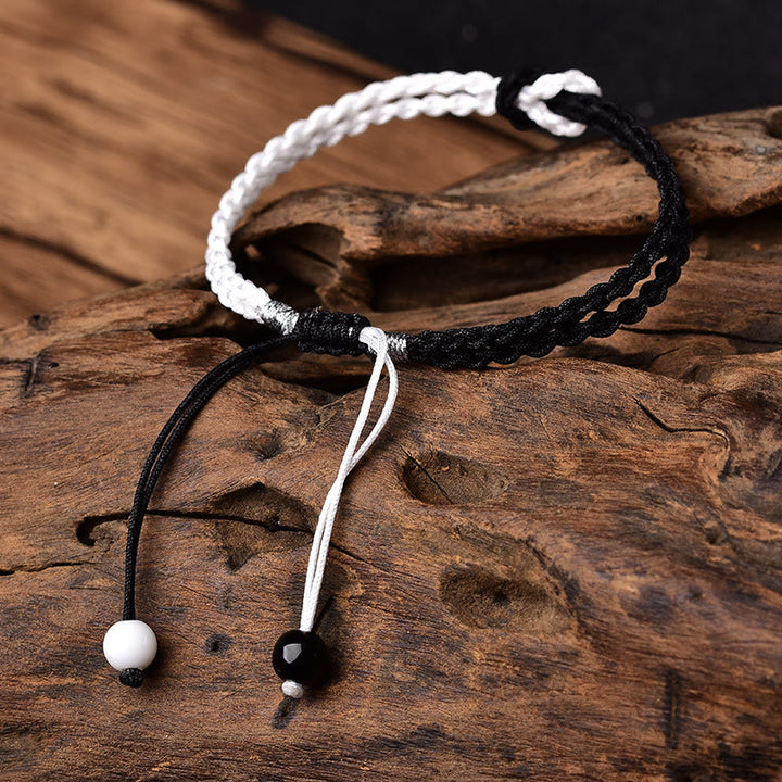 Pulsera curativa trenzada de cuerda blanca y negra hecha a mano con Buddha Stones