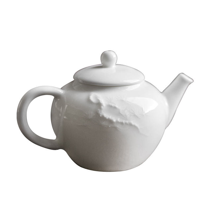 Tetera de cerámica con diseño grabado de bambú de pino ciruelo blanco