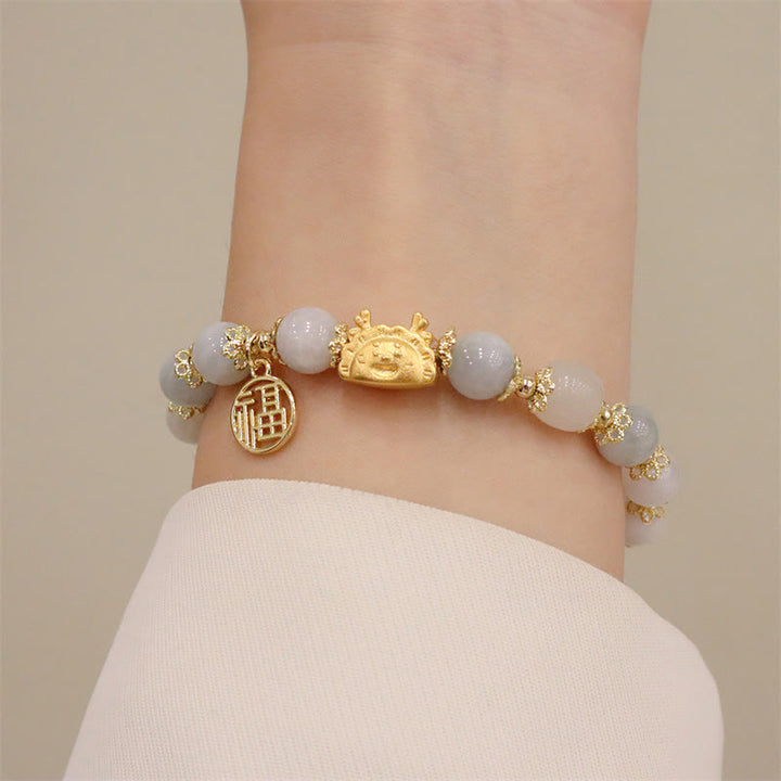 Buddha Stones Año del Dragón Ágata roja Cuarzo fresa Obsidiana negra Jade Granate Perla Cinabrio Bola de masa Dragón Suerte Fu Pulsera con personajes