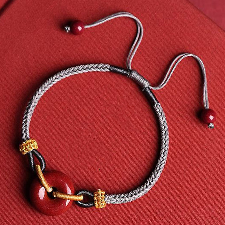 Pulsera Trenzada del Patrón de Cierre de Paz de Cinabrio Hecho a Mano Buddha Stones