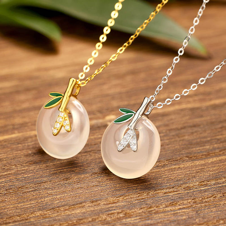 Colgante positivo del collar de la hebilla de la paz de la hoja de bambú de la calcedonia natural de la plata esterlina de las Buddha Stones - image 1