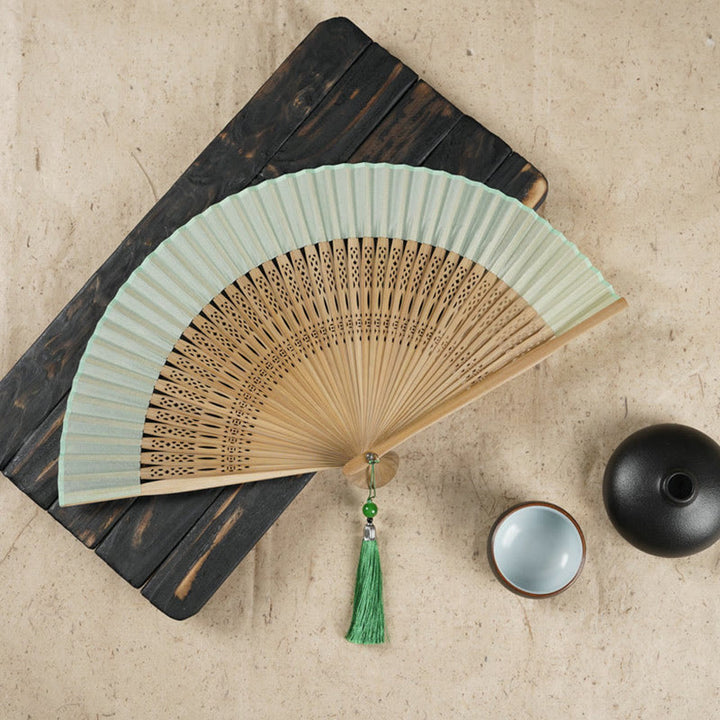 Abanico plegable de bambú de mano grabado con flor de cerezo Simple con Buddha Stones - Verde 22 cm - image 0