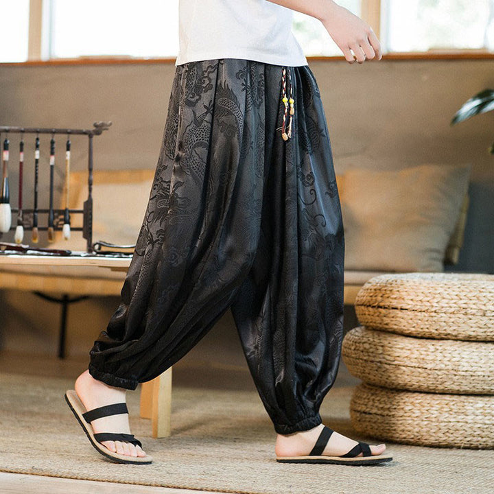 Pantalones bombachos holgados con estampado de dragón y Buddha Stones para hombre con bolsillos