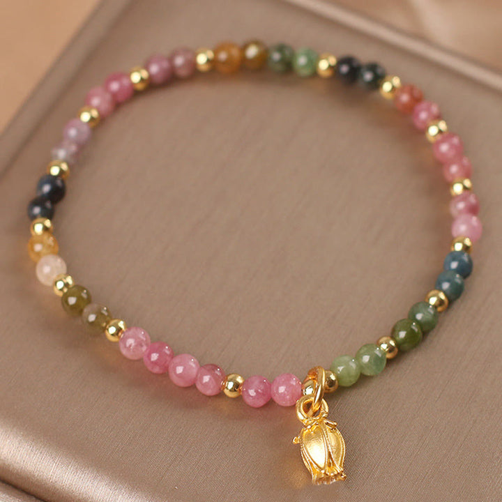 Pulsera Positiva con Flores de Turmalina Coloridas y Buddha Stones