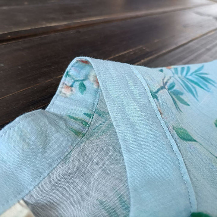Camisa de lino con manga larga y botones de rana , con Buddha Stones, flores de color verde claro y rosa y hojas verdes