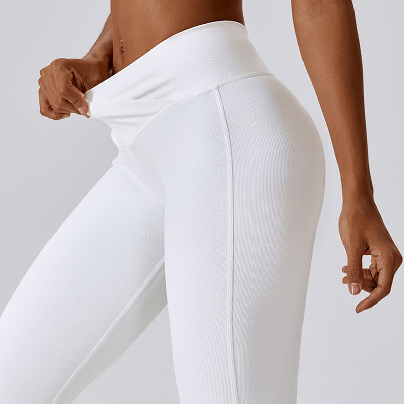 Top corto sin mangas con Buddha Stones y pantalones acampanados para deportes, fitness y yoga