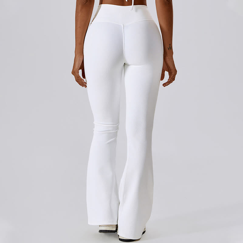 Top corto sin mangas con Buddha Stones y pantalones acampanados para deportes, fitness y yoga