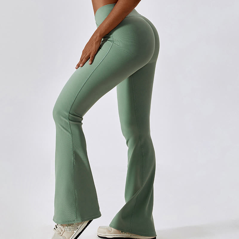 Top corto sin mangas con Buddha Stones y pantalones acampanados para deportes, fitness y yoga