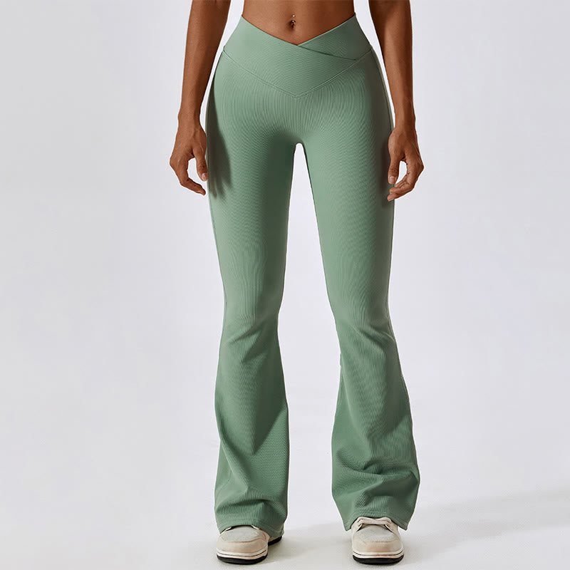 Top corto sin mangas con Buddha Stones y pantalones acampanados para deportes, fitness y yoga