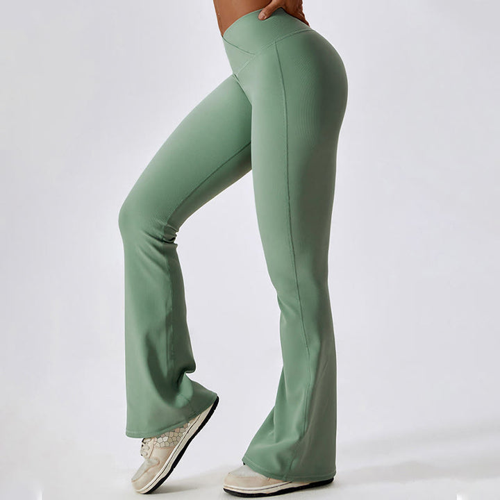 Top corto sin mangas con Buddha Stones y pantalones acampanados para deportes, fitness y yoga