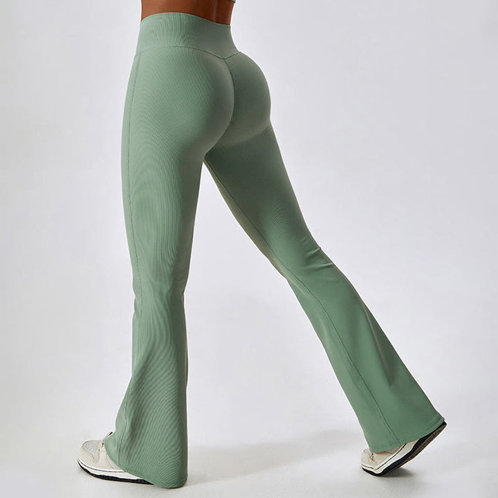 Top corto sin mangas con Buddha Stones y pantalones acampanados para deportes, fitness y yoga