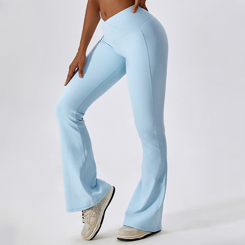 Top corto sin mangas con Buddha Stones y pantalones acampanados para deportes, fitness y yoga