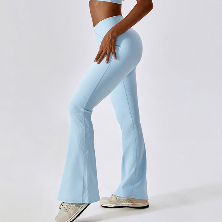 Top corto sin mangas con Buddha Stones y pantalones acampanados para deportes, fitness y yoga