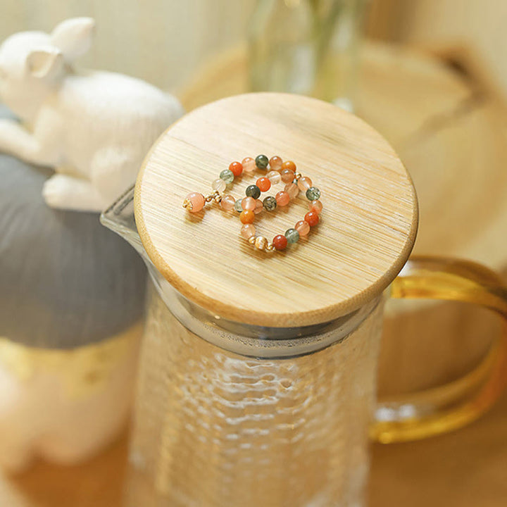 Buddha Stones Anillo de cobre bañado en oro de 14 k con cristales Fu Lu Shou y piedra lunar melocotón. - image 1