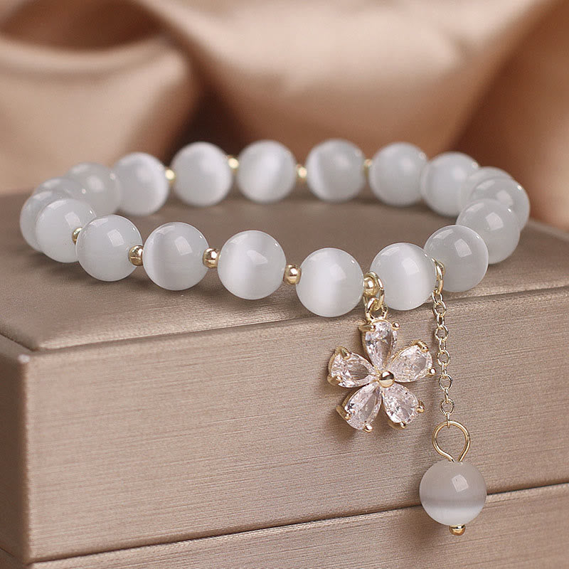 Buddha Stones Pulsera de apoyo a la paz con dije de flor de ojo de gato - image 1
