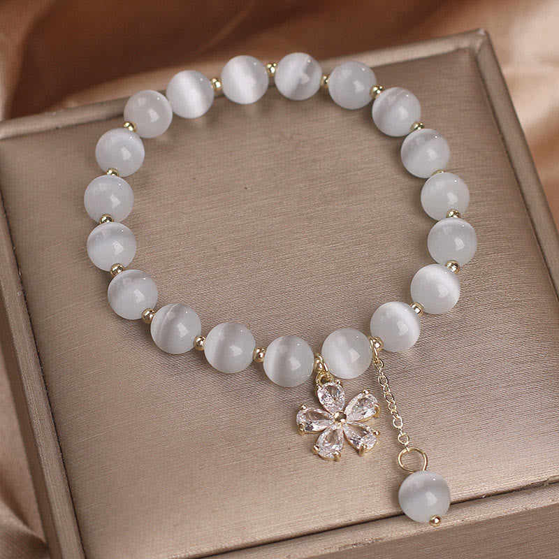 Buddha Stones Pulsera de apoyo a la paz con dije de flor de ojo de gato - image 2
