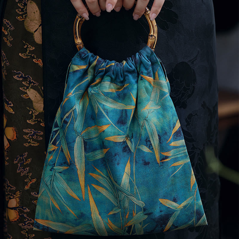 Buddha Stones Bolso de mano con asas de bambú y hojas de bambú azul y verde - image 1