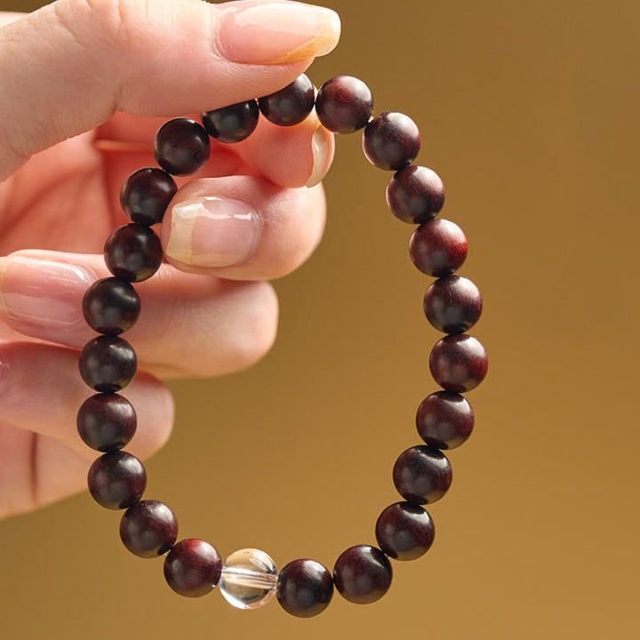 Pulsera de protección de cristal blanco de sándalo rojo hoja pequeña de Buddha Stones