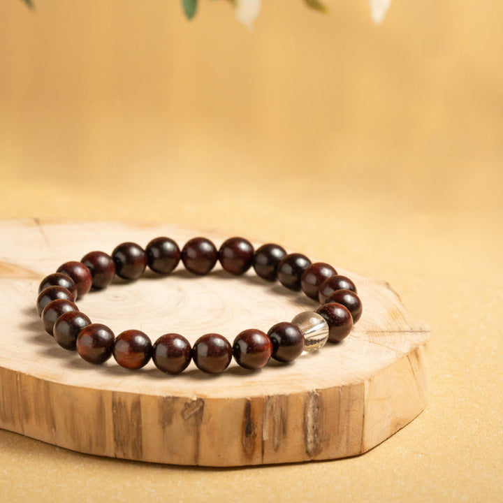 Pulsera de protección de cristal blanco de sándalo rojo hoja pequeña de Buddha Stones