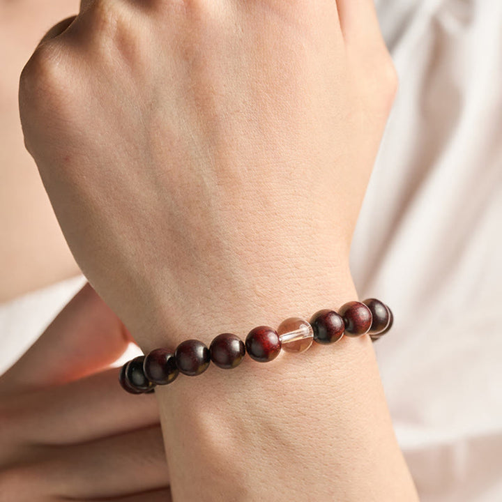 Pulsera de protección de cristal blanco de sándalo rojo hoja pequeña de Buddha Stones