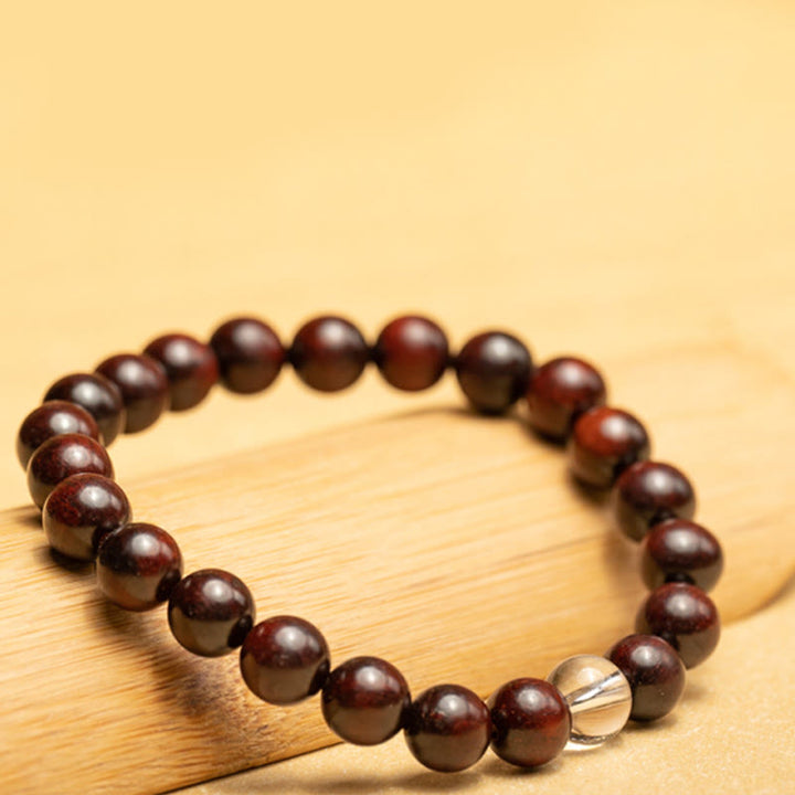 Pulsera de protección de cristal blanco de sándalo rojo hoja pequeña de Buddha Stones