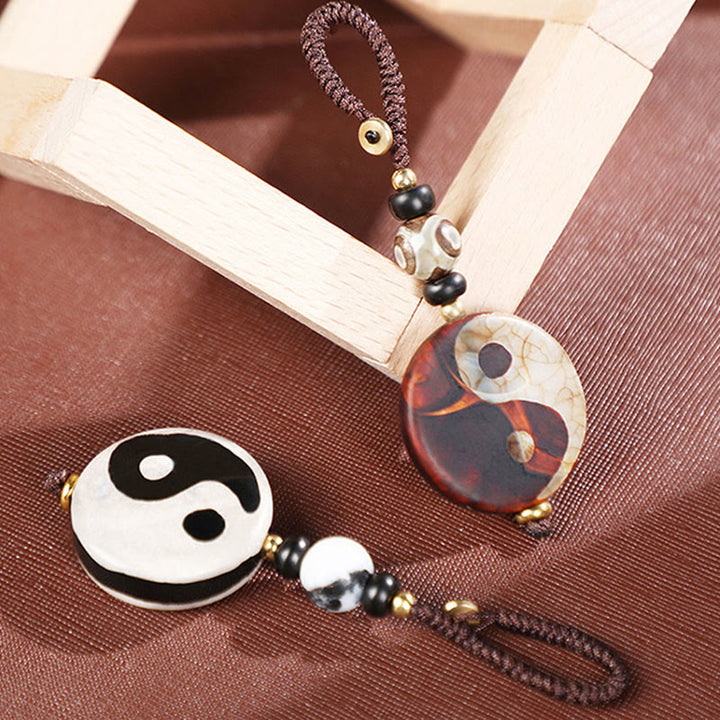 Llavero con cuentas de ágata natural Yin Yang Dzi con Buddha Stones