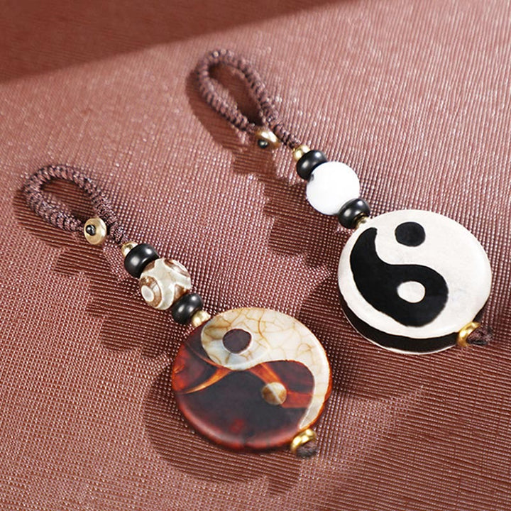 Llavero con cuentas de ágata natural Yin Yang Dzi con Buddha Stones