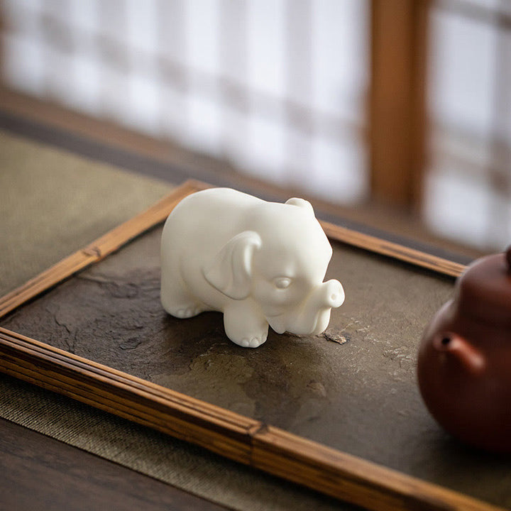 Estatua de elefante pequeña de Buddha Stones, porcelana blanca, cerámica, decoración de escritorio para el hogar - Cabeza de elefante hacia abajo 5,5 x 5,5 x 8,5 cm - image 0