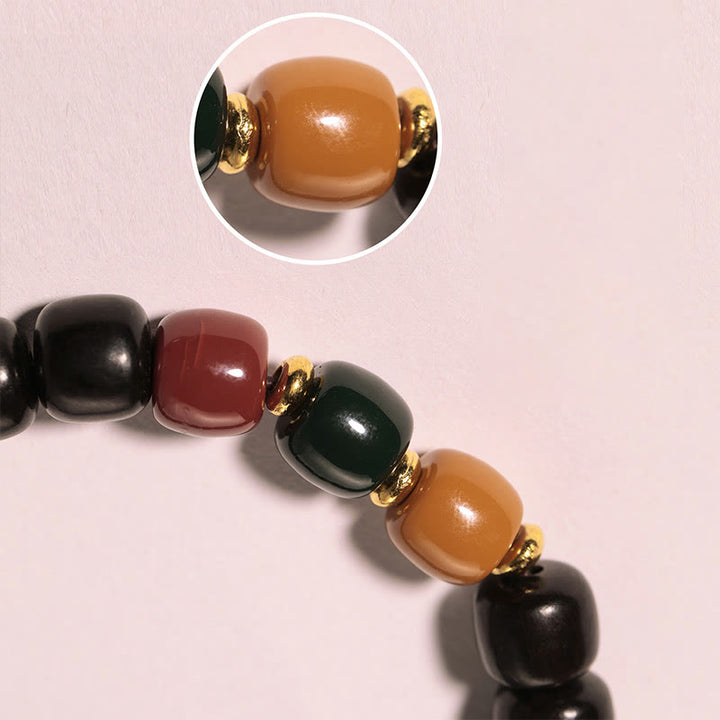 Pulsera de equilibrio de paz de palisandro de madera de ébano con Buddha Stones