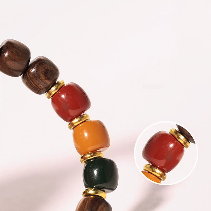Pulsera de equilibrio de paz de palisandro de madera de ébano con Buddha Stones