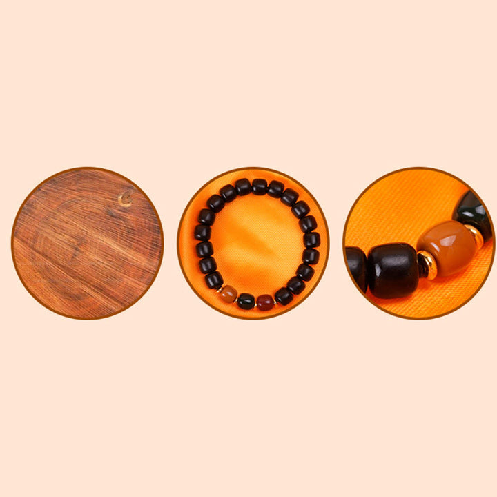 Pulsera de equilibrio de paz de palisandro de madera de ébano con Buddha Stones