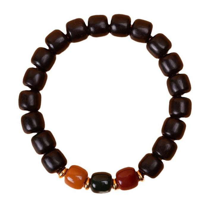 Pulsera de equilibrio de paz de palisandro de madera de ébano con Buddha Stones
