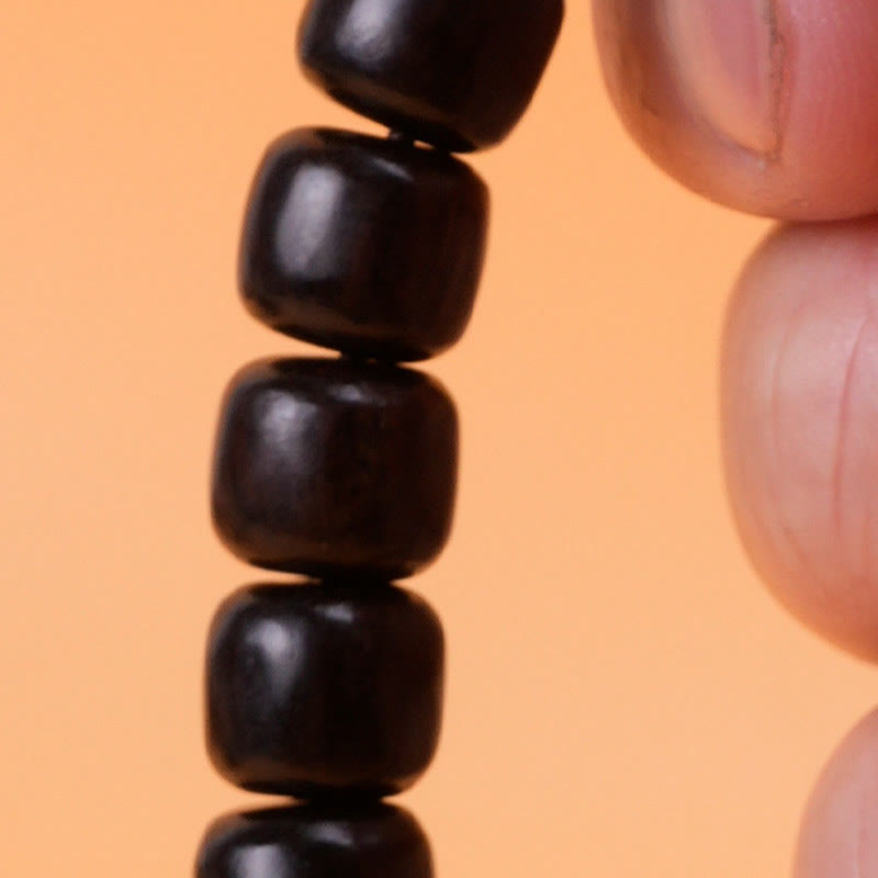 Pulsera de equilibrio de paz de palisandro de madera de ébano con Buddha Stones