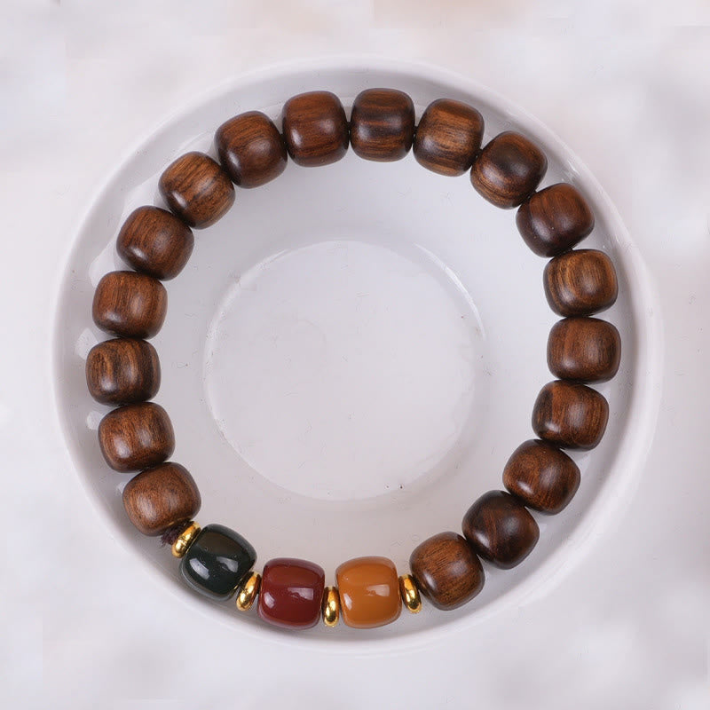 Pulsera de equilibrio de paz de palisandro de madera de ébano con Buddha Stones
